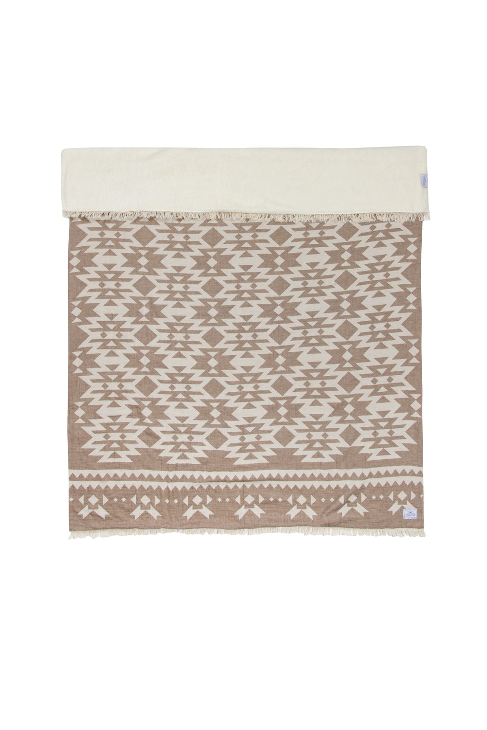 brown and white patterned blanket with eyelash fringe with fleece lining on a white background #colour_walnut