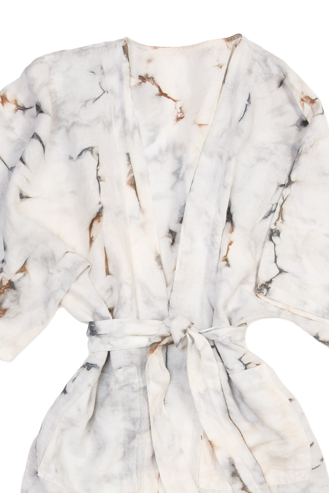A marble tie-dyed linen belted cover-up robe, tied, laid flat against a white background.