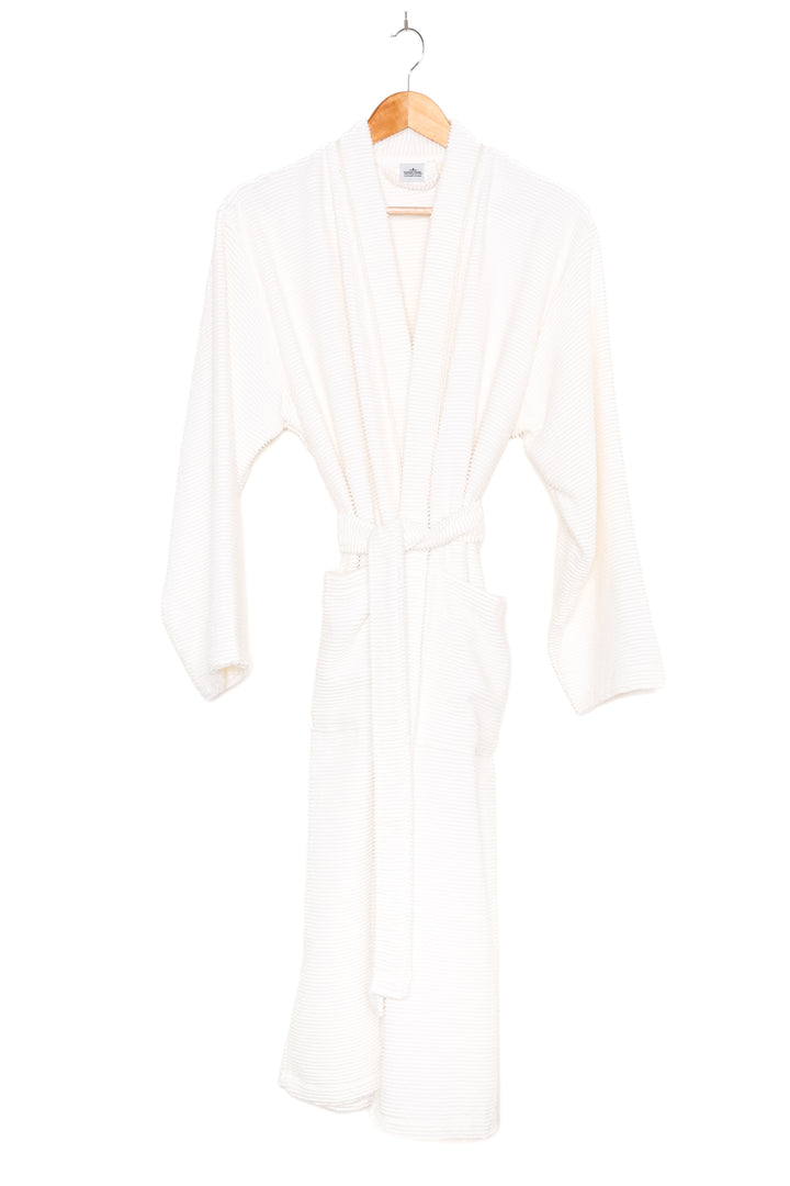 mid length white relaxed fit cotton terry spa robe on a hanger against a white background  #colour_off-white