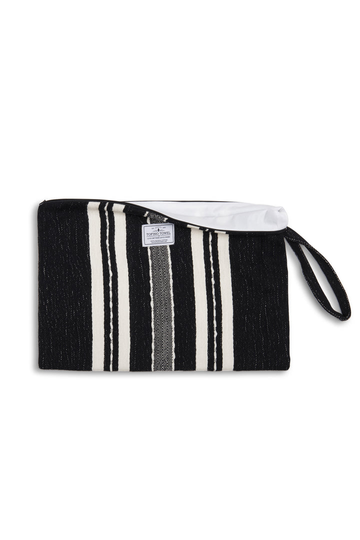 Large black zip up pouch with white stripes and a wrist handle on a white background