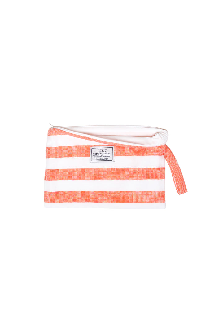 white and coral striped zip up pouch with wrist handle on a white background #colour_coral-stripes
