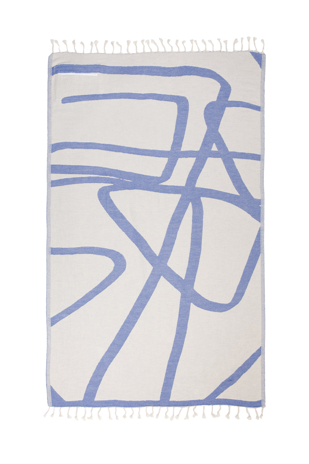 Turkish cotton towel with an abstract white and blue design and eyelash fringe laid flat on a white background #colour_blue