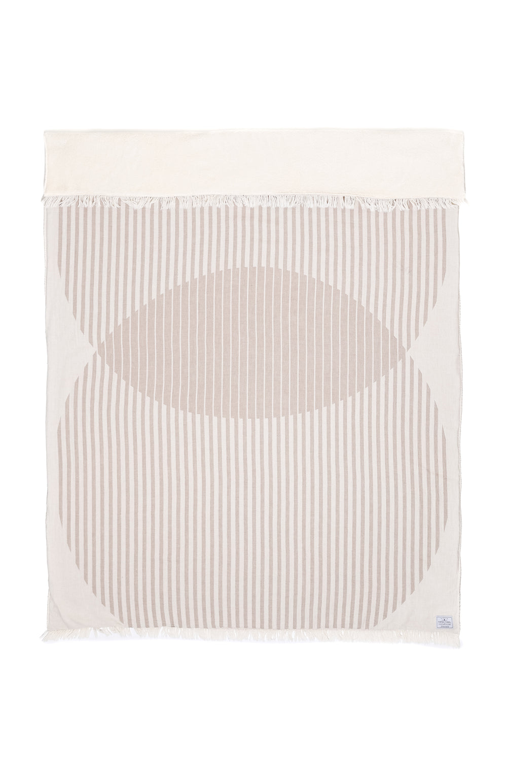 off white and beige fleece lined throw with a retro over lapping circle design with eyelash fringe laid flat with one side folded down on a white background #colour_beige
