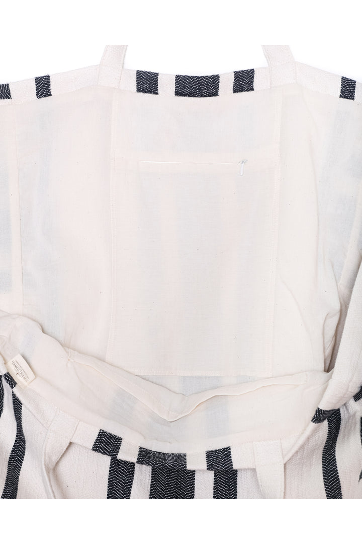close up of oversized white and black striped Turkish cotton tote bag on a white background #colour_black