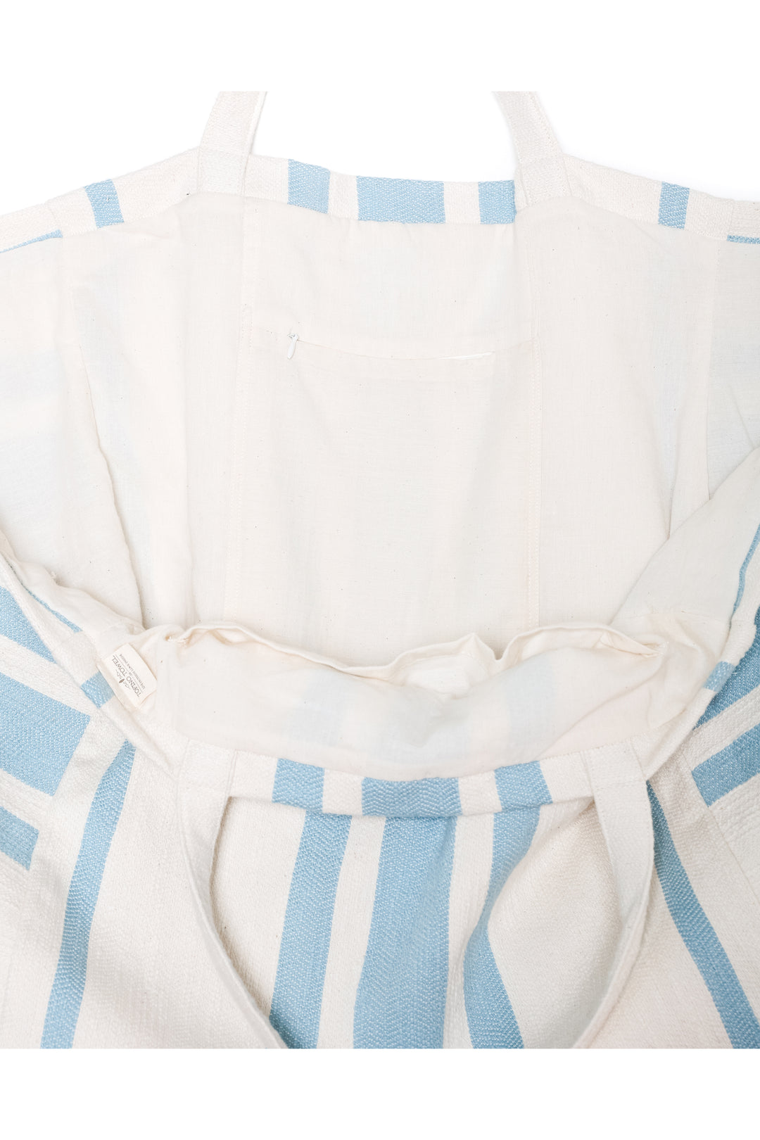 close up of oversized white and light blue striped Turkish cotton tote bag on a white background #colour_blue