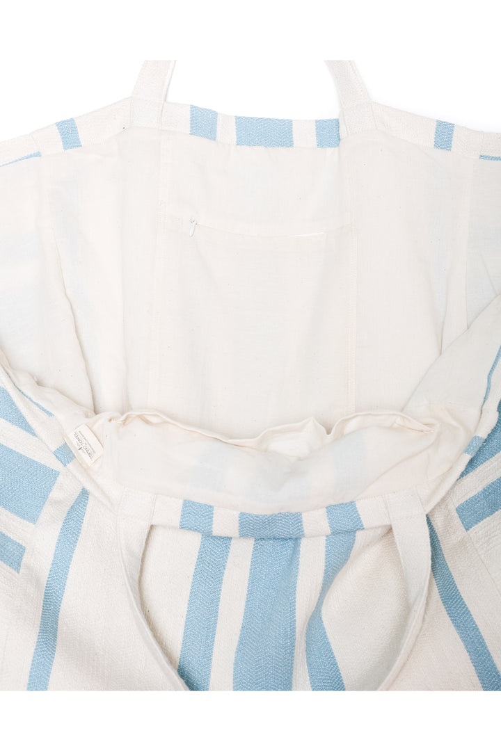 close up of oversized white and light blue striped Turkish cotton tote bag on a white background #colour_blue
